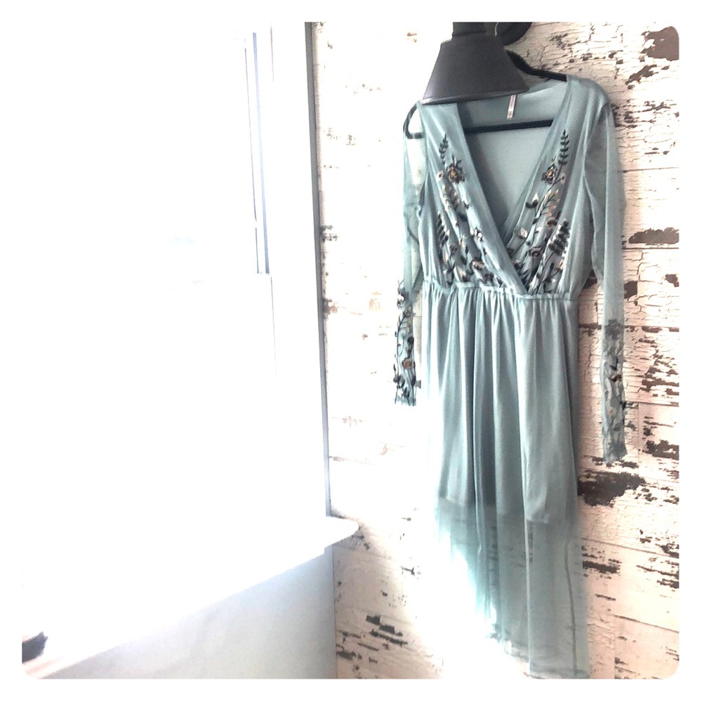 Midi Dress. Shorter material with longer mesh